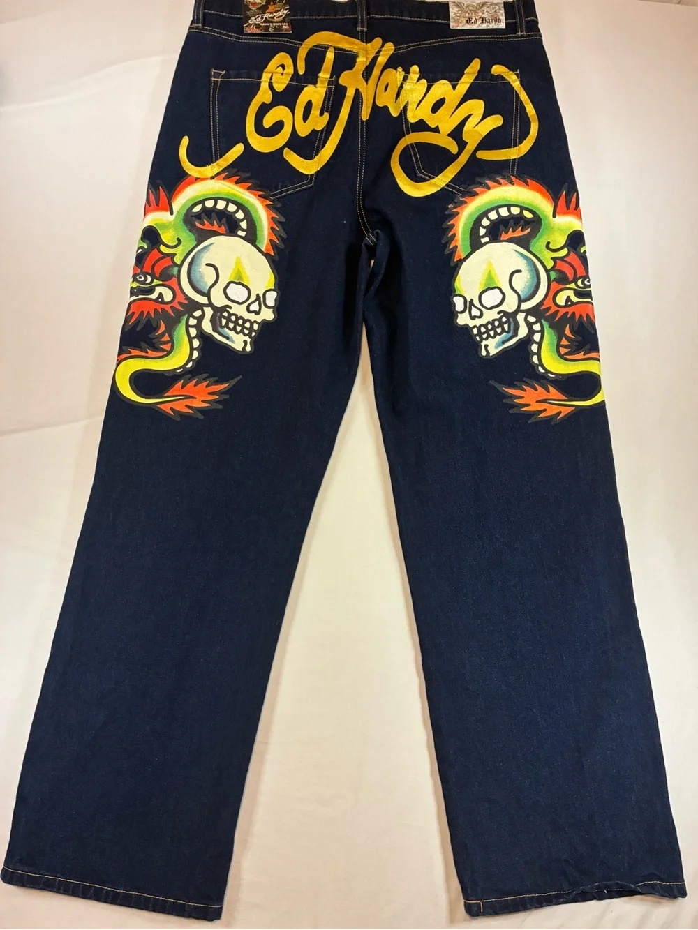 Ed Hardy Dark Blue Jeans with Yellow Script and Neon Skull Artwork
